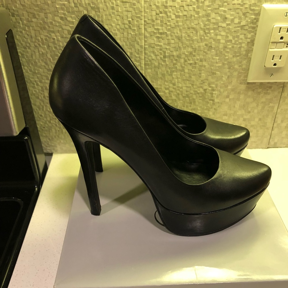 Black platform pumps